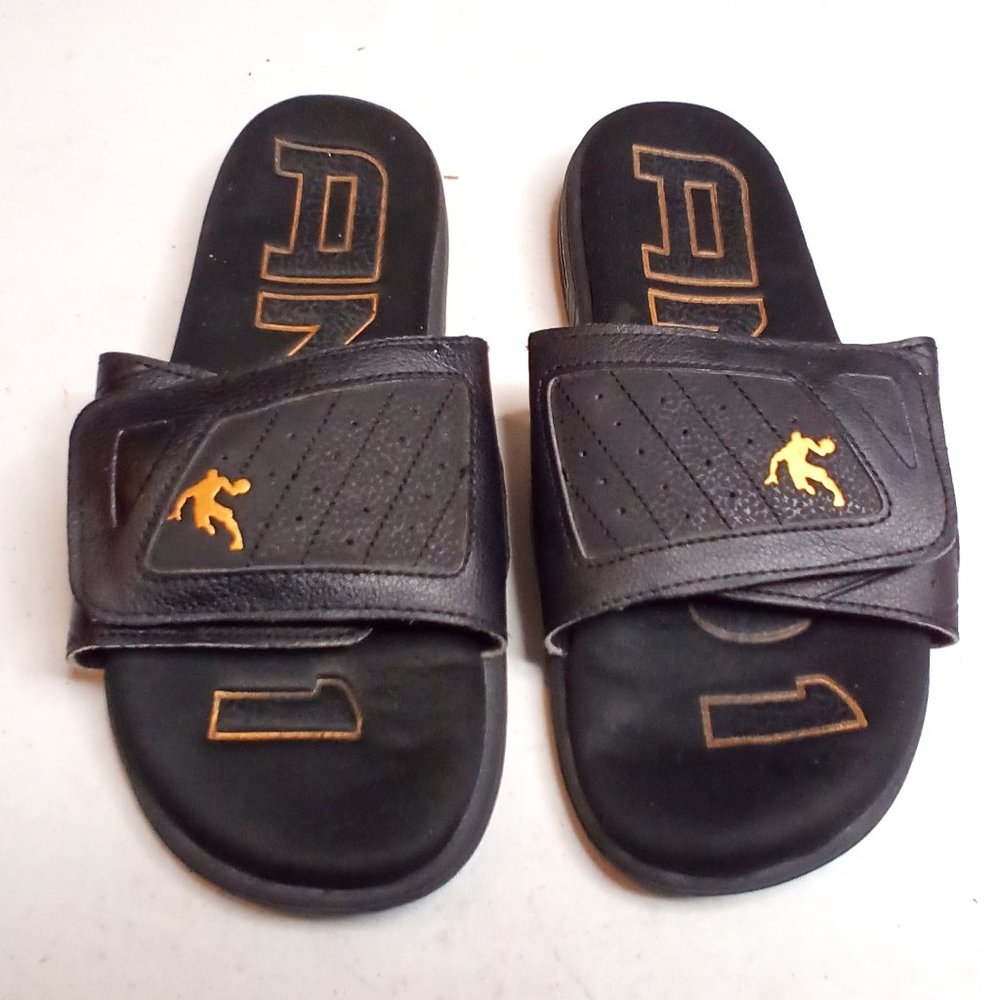 And One slides unisex black and gold velcro size 10 1/2".